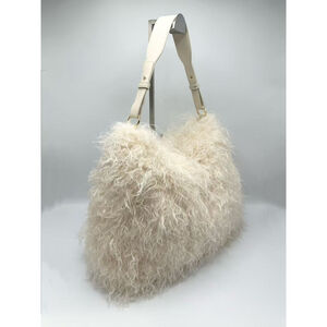 Grand sac hobo en fausse fourrure synthétique à texture moelleuse