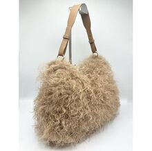 Grand sac hobo en fausse fourrure synthétique à texture moelleuse