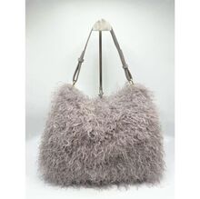 Grand sac hobo en fausse fourrure synthétique à texture moelleuse