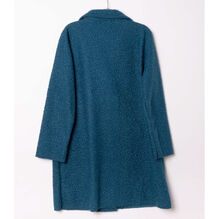 Manteau mi-long en bouclé doux à double boutonnage avec poches