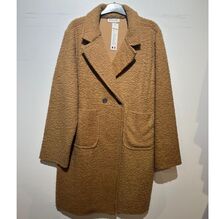 Manteau mi-long en bouclé doux à double boutonnage avec poches