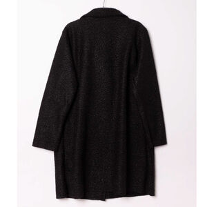 Manteau mi-long en bouclé doux à double boutonnage avec poches