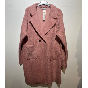 Manteau mi-long en bouclé doux à double boutonnage avec poches