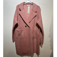 Manteau mi-long en bouclé doux à double boutonnage avec poches