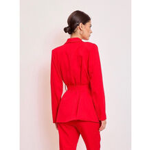 Veste de tailleur à col châle avec une ceinture à nouer à la taille