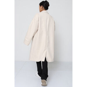 Manteau oversize mi-long avec des poches latérales pratiques