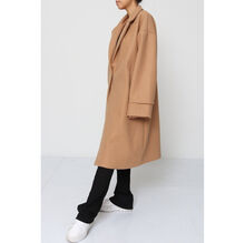 Manteau oversize mi-long avec des poches latérales pratiques