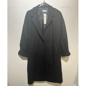 Manteau oversize mi-long avec des poches latérales pratiques