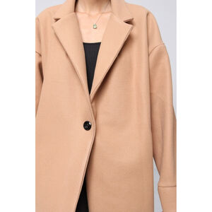 Manteau oversize mi-long avec des poches latérales pratiques