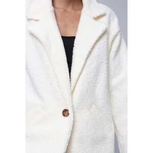 Manteau boutonné en tissu bouclée doté de poches pratiques