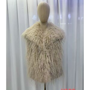 Manteau sans manches en fausse fourrure à poils longs et 2 poches latérales