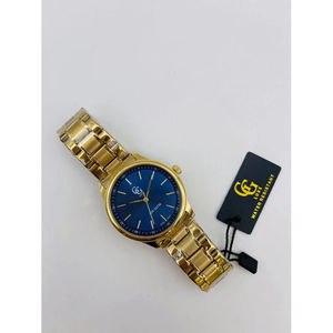 Montre analogique à bracelet en métal doré et fond bleu