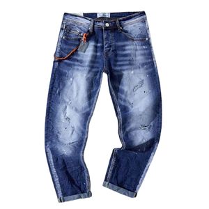 Jeans homme en coton avec légères usures décoratives
