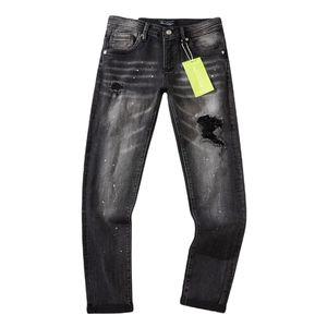 Grossiste de jeans gris slim homme à effet délavé déchiré et taché