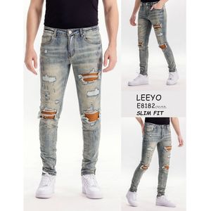 Pantalon jean bleu coupe slim effet délavé usé en coton