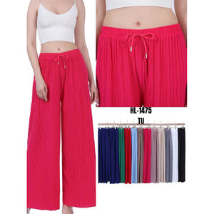 Pantalon coupe ample effet plissée avec une ceinture élastique