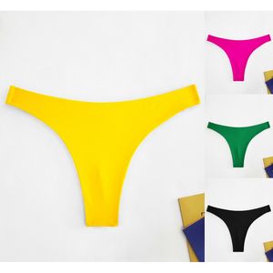 Bas de bikini femme coupe échancrée dans une couleur unie