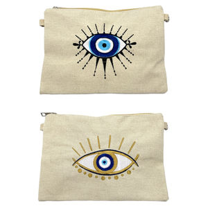 Petite trousse à motif "œil" avec une bandoulière amovible