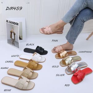 Mules bout carré et talon plat avec lanières entrecroisées