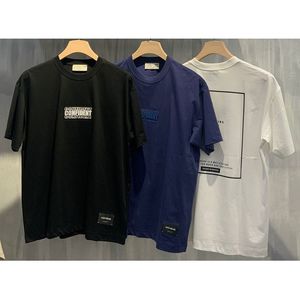 T-shirt uni à col rond en coton avec motif CONFIDENT