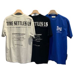 T-shirt basique en coton uni avec le message TIME SETTLES US