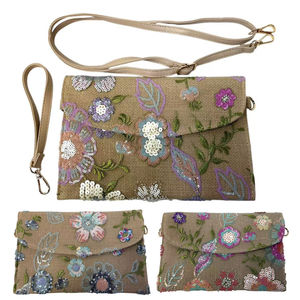 Pochette en toile de jute avec broderies florales à paillettes