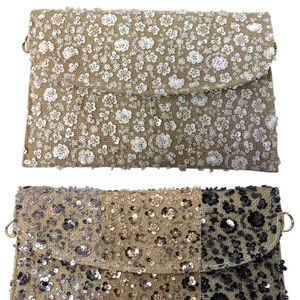 Pochette en toile de jute avec embellissement de séquins florales