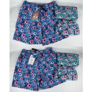 Short de plage avec filet intérieur et motif exotique de fleurs tropicales