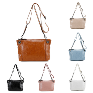 Sac avec bandoulière à motif et détails plissés sur les côtés