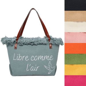 Cabas zippé "Libre comme l'air" et un oiseau accentué par des franges