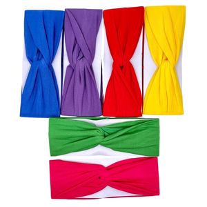 Bandeau à un nœud central torsadé design uni et vibrant