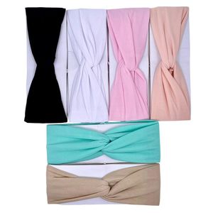 Bandeau stylé avec nœud twisté devant d'une teinte unie