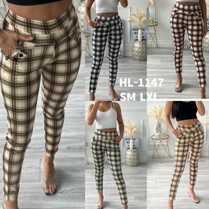 Pantalon imprimé à carreaux dans une coupe slim taille haute