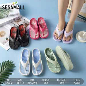 Tongs compensées à semelle ornée des motifs avec palmiers