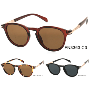 Lunettes de soleil femme rondes classiques à dorure sur les branches