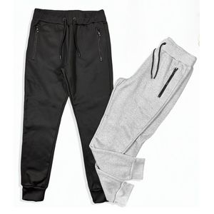 Pantalon de jogging uni pour homme avec poches zippées