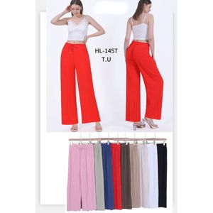 Pantalon coupe large fluide marqué par des plis fins et verticaux