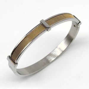 Bracelet en acier inoxydable argenté avec insert en maille dorée