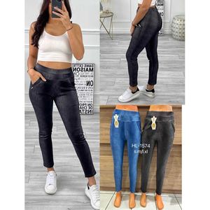 Pantalon jegging effet denim délavé à taille élastiquée avec poches