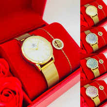 Coffret rouge avec roses : montre cerclée à lanière dorée + bijoux en acier