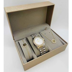 Coffret taupe : montre arrondie sertis de strass en métal argenté et doré + bijoux en acier