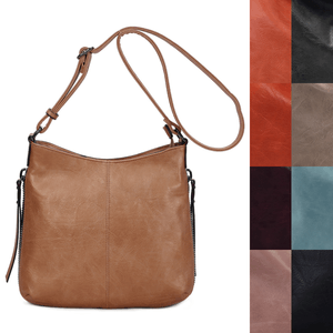 Besace en cuir synthétique avec des zips latéraux décoratifs