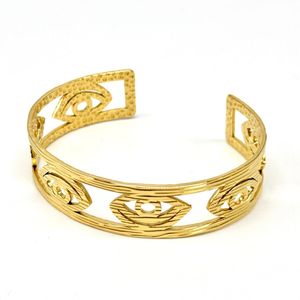 Bracelet jonc manchette doré ouvert à motifs Œil Protecteur Moderne