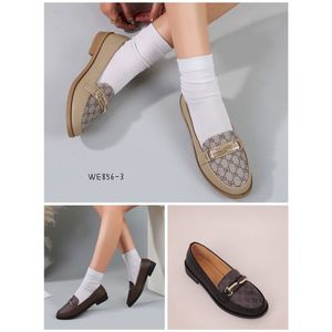 Mocassins bicolores avec motif monogramme et détail décoratif doré taille 36 - 41