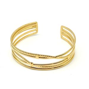 Bracelet Jonc à plusieurs fines bandes avec liaison discrets en acier inoxydable