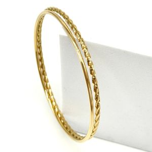 Bracelet deux joncs distincts en acier de couleur doré lot de 7 pièces