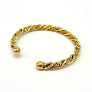 Bracelet en acier inoxydable à brins dorées enroulés façon spirale