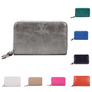 Portefeuille uni de format moyen avec une fermeture complète