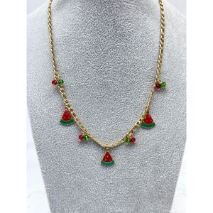 Collier harmonieux à  breloques délice de pastèque doré
