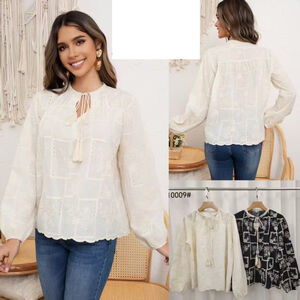 Blouse bohème à broderie anglaise col rond avec liens à nouer